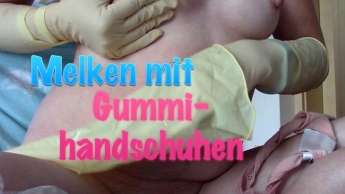 Melken mit Gummihandschuhen