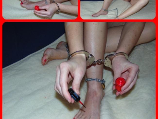 Nail painting in handcuffs