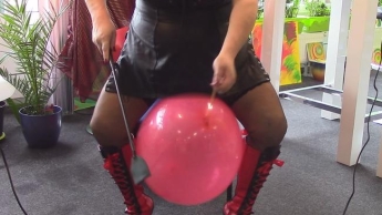 Riding the red ball with my red-black boots and my whip !! NON-POP