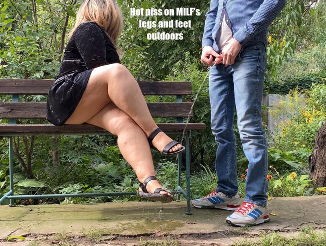 Hot piss on MILF’s legs and feet outdoors